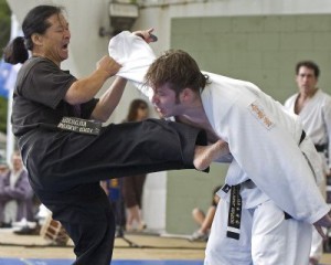 Grand Master Choi & Student Demonstrating Self Defence Technique